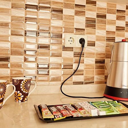 Bursa Suites Apart Otel Экстерьер фото A kettle plugged into a wall socket