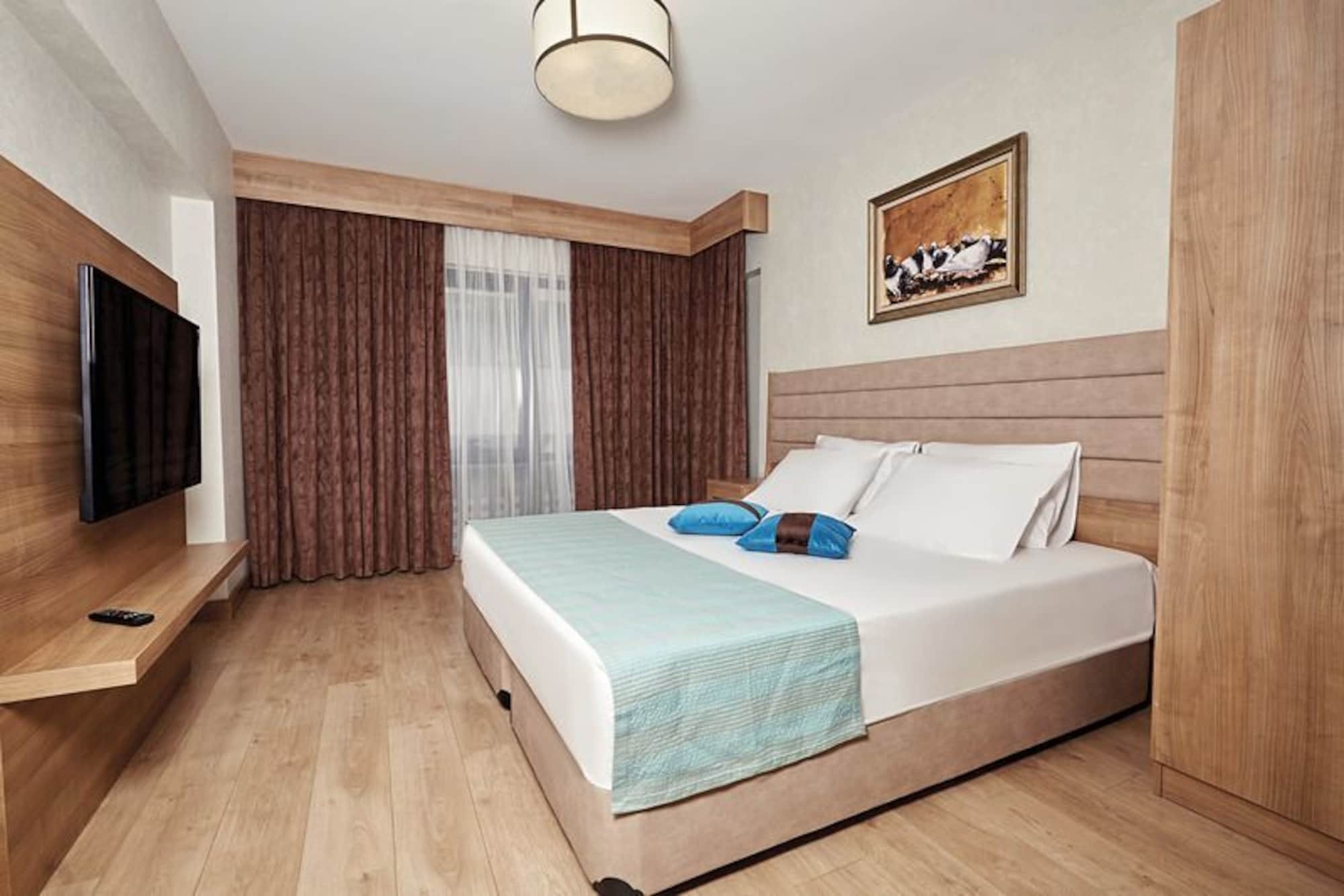 Bursa Suites Apart Otel Экстерьер фото A bedroom in a hotel